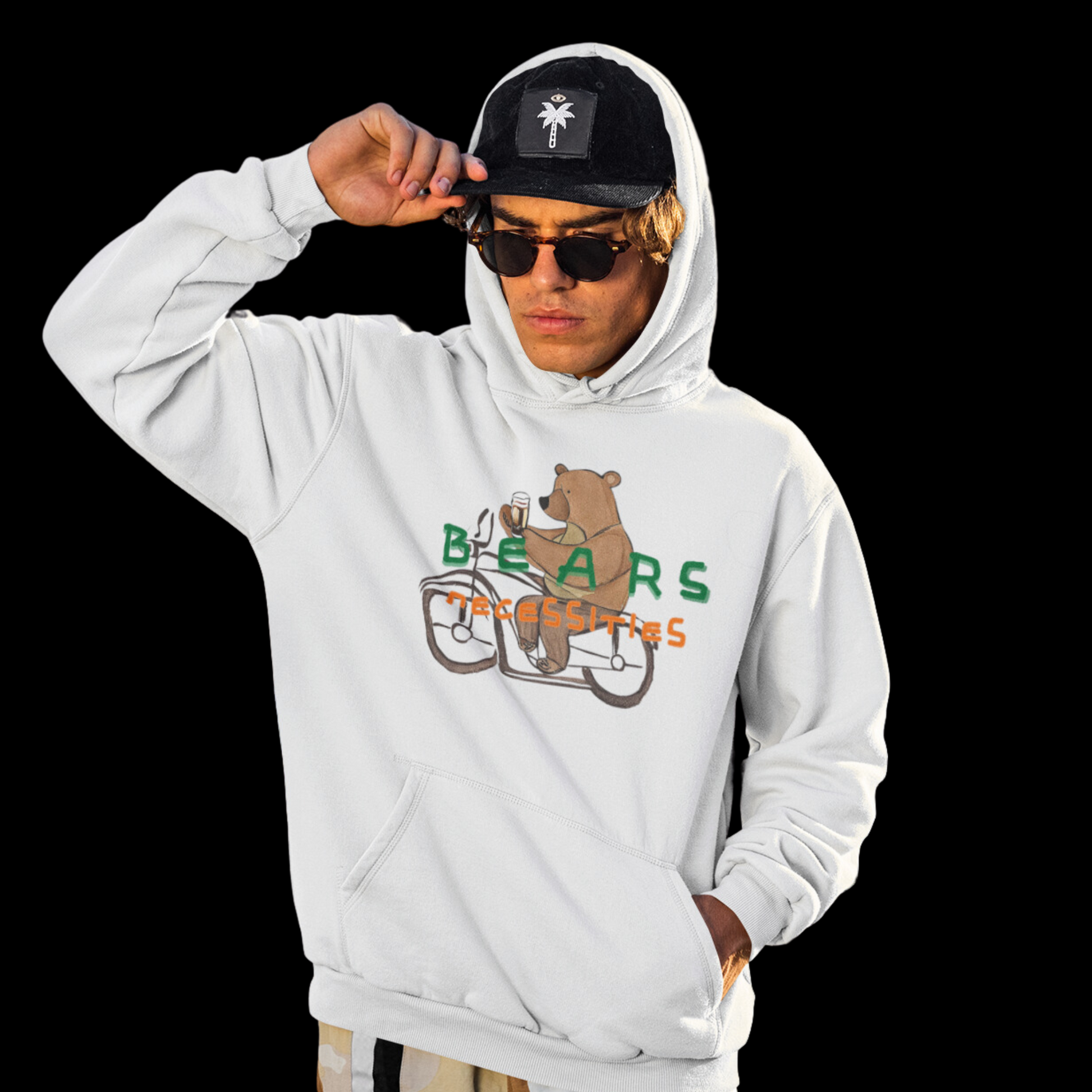 Cosy hoodie featuring a playful graphic of a bear riding a bike with an Irish beer in hand, topped with the phrase 'Bear's Necessities.'