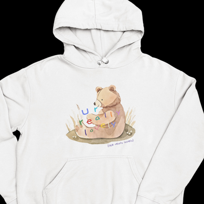 Graphic Design hoodie with an adorable bear graphic and the phrase 'U R Lovely' on the front, made from soft cotton.