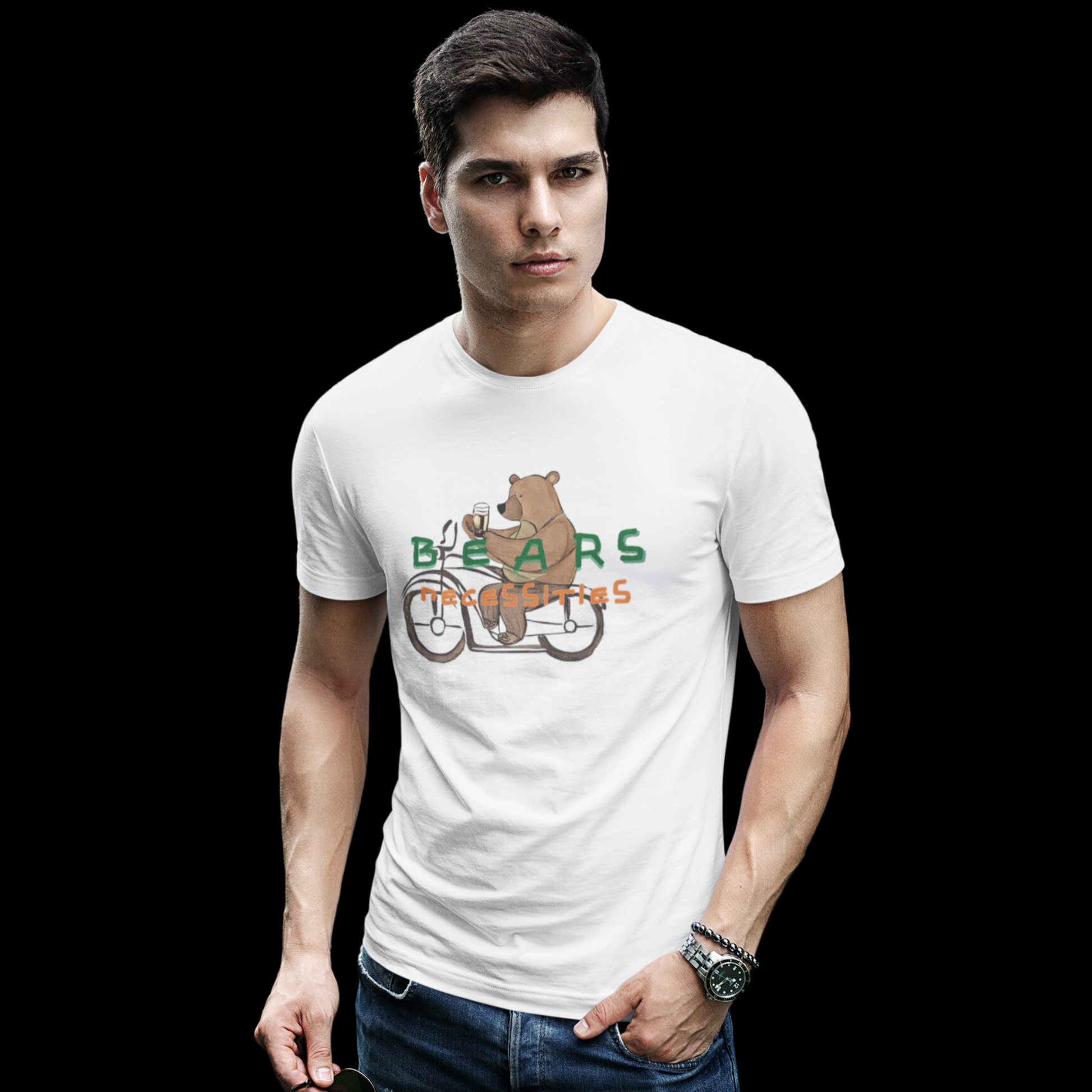 White t-shirt featuring a graphic of a bear cycling while holding an Irish beer, with the words 'Bears Necessities' displayed on top.