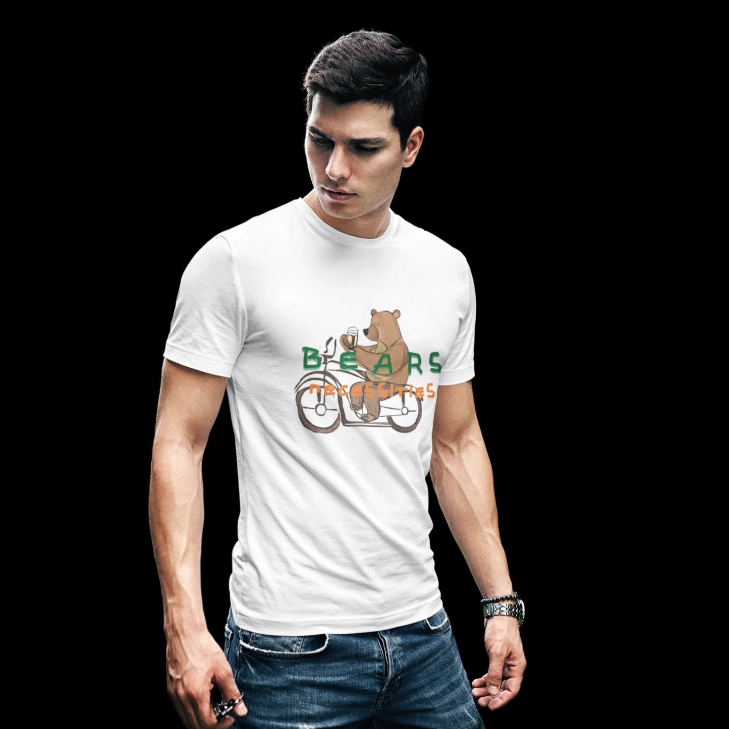 White t-shirt featuring a graphic of a bear cycling while holding an Irish beer, with the words 'Bears Necessities' displayed on top.